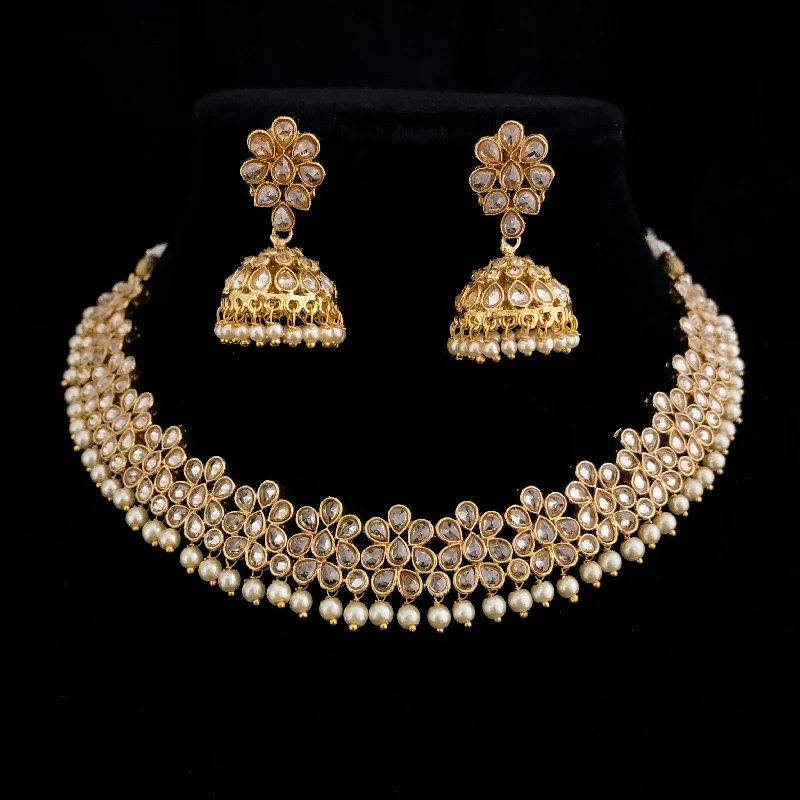 women's high-end designer necklaces-Stunning Antique Gold Designer Choker style Necklace set with LCD Polki style champagne stones and jhumka earring