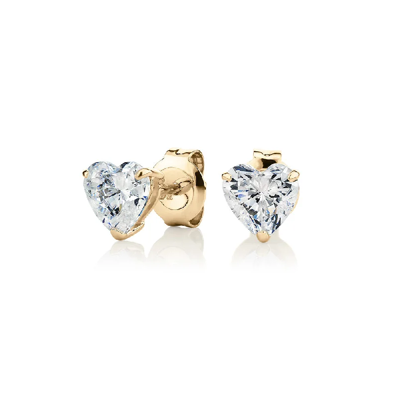 women's gemstone earrings-Heart stud earrings with 2 carats* of diamond simulants in 10 carat yellow gold