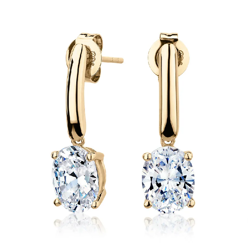 women's multi-stone earrings-Oval drop earrings with 3.72 carats* of diamond simulants in 10 carat yellow gold