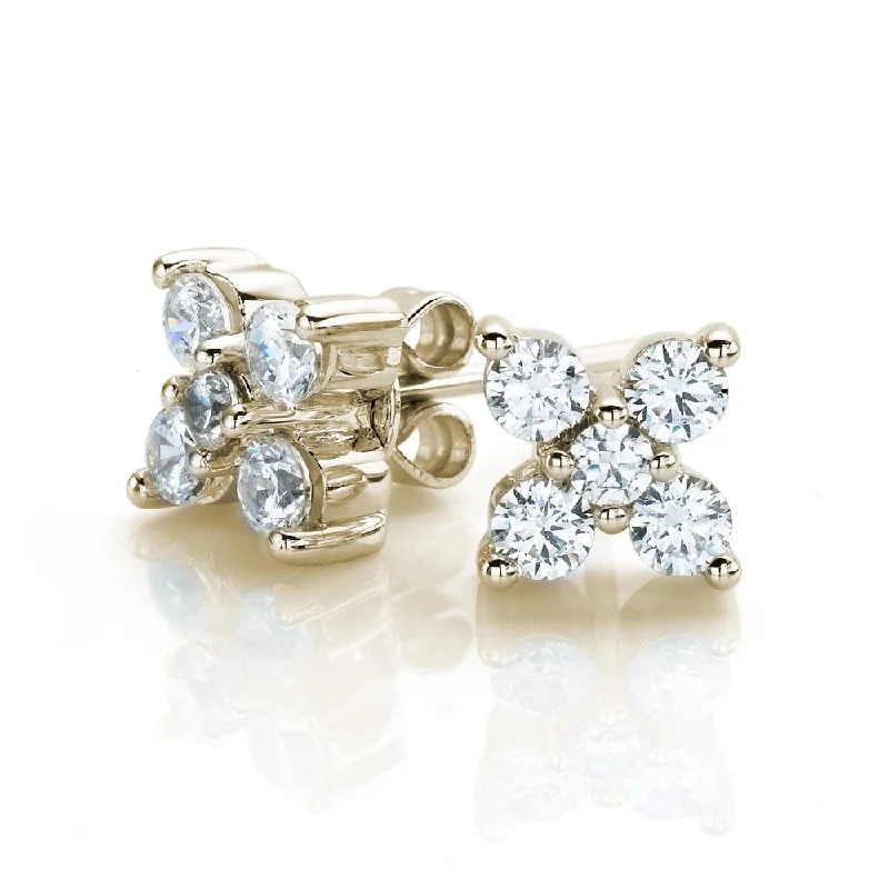 women's celestial earrings-Round Brilliant stud earrings with 0.54 carats* of diamond simulants in 10 carat yellow gold