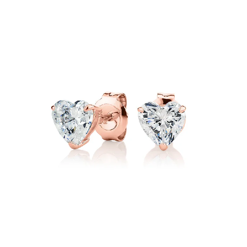 women's silver dangly earrings-Heart stud earrings with 2 carats* of diamond simulants in 10 carat rose gold