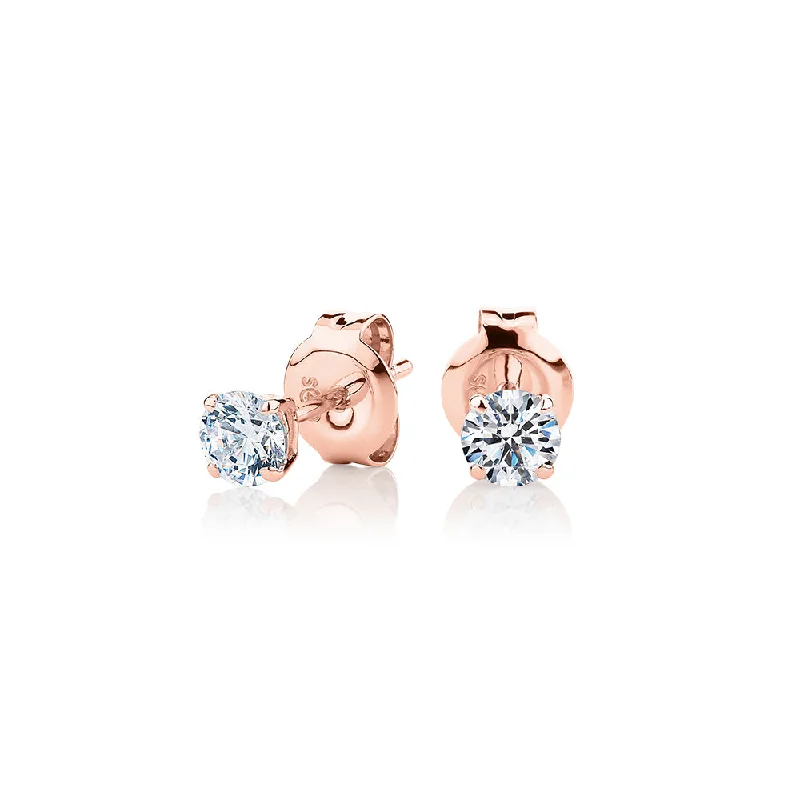 women's bohemian earrings-Round Brilliant stud earrings with 0.5 carats* of diamond simulants in 10 carat rose gold