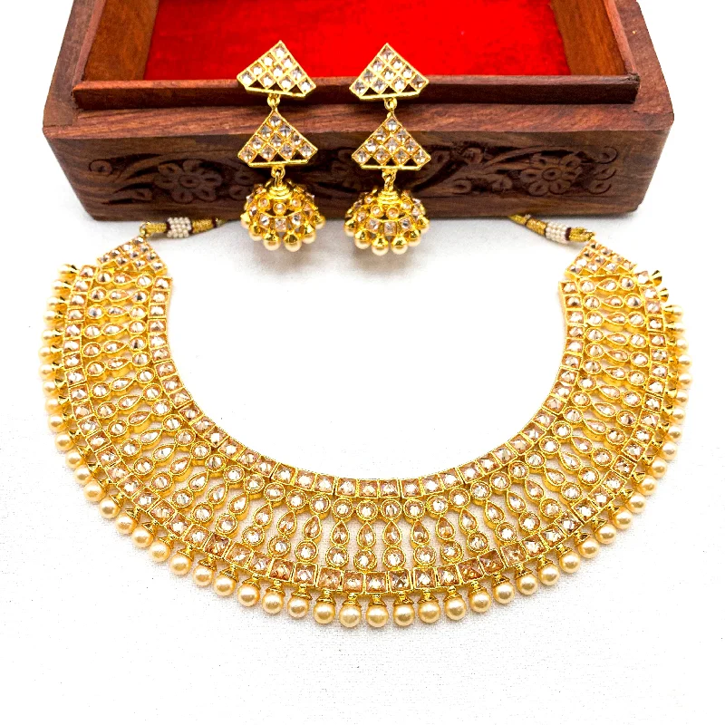 women's celestial charm necklaces-Gorgeous Antique Gold plated Bridal Necklace Set with LCD Champagne stones and Jumka