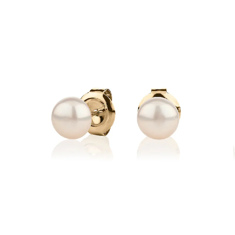 women's modern earrings-Cultured freshwater pearl 6.5mm stud earrings in 10 carat yellow gold