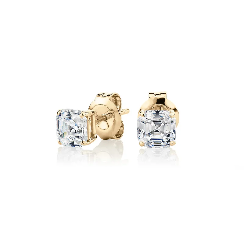 women's silver earrings-Asscher stud earrings with 1 carats* of diamond simulants in 10 carat yellow gold