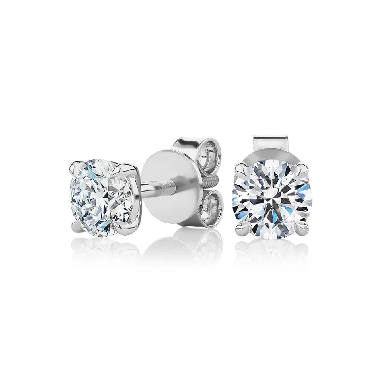 women's geometric design earrings-Signature Simulant Diamond 1.40 carat* TW round brilliant stud earrings in 14 carat white gold