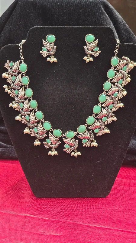 women's custom engraved necklaces-Wonderful Pista Green Bird Shaped Necklace Set