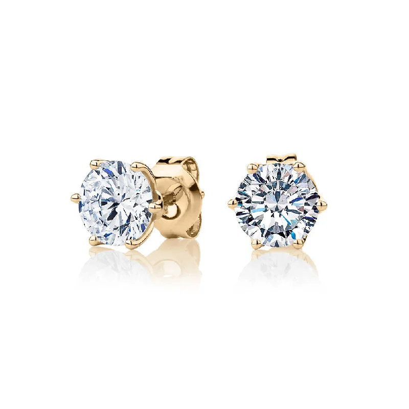 women's fashion-forward earrings-Round Brilliant stud earrings with 2 carats* of diamond simulants in 10 carat yellow gold