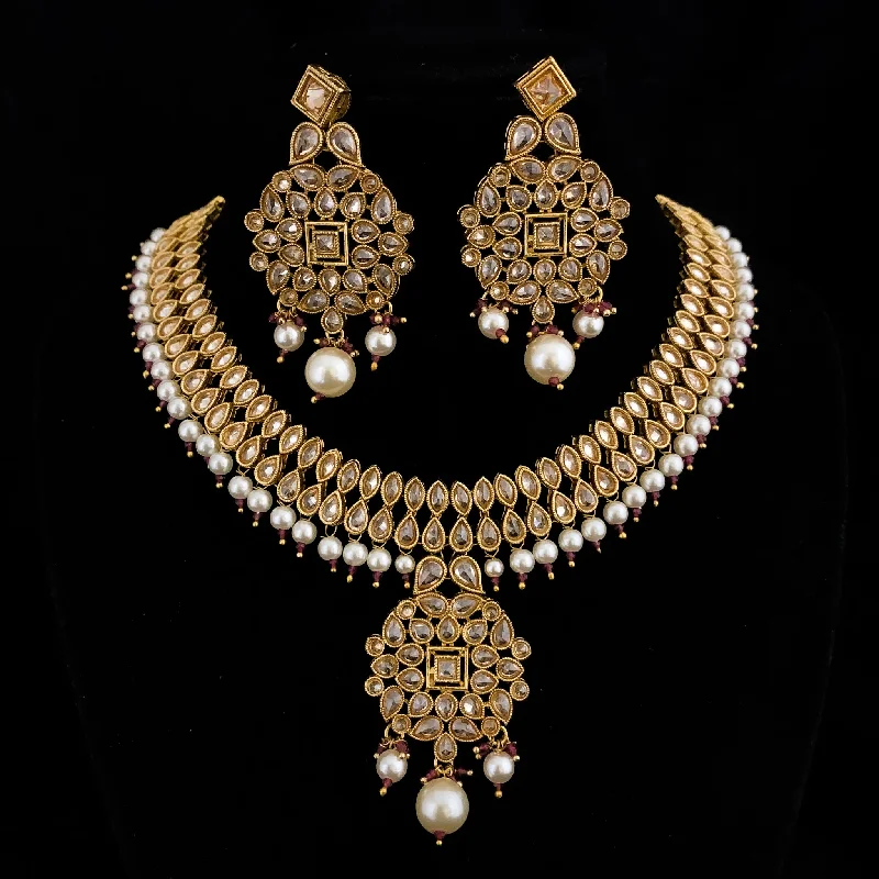 women's statement necklaces-Lustrous Jumbora Antique Gold Necklace Set with LCD polki Stones