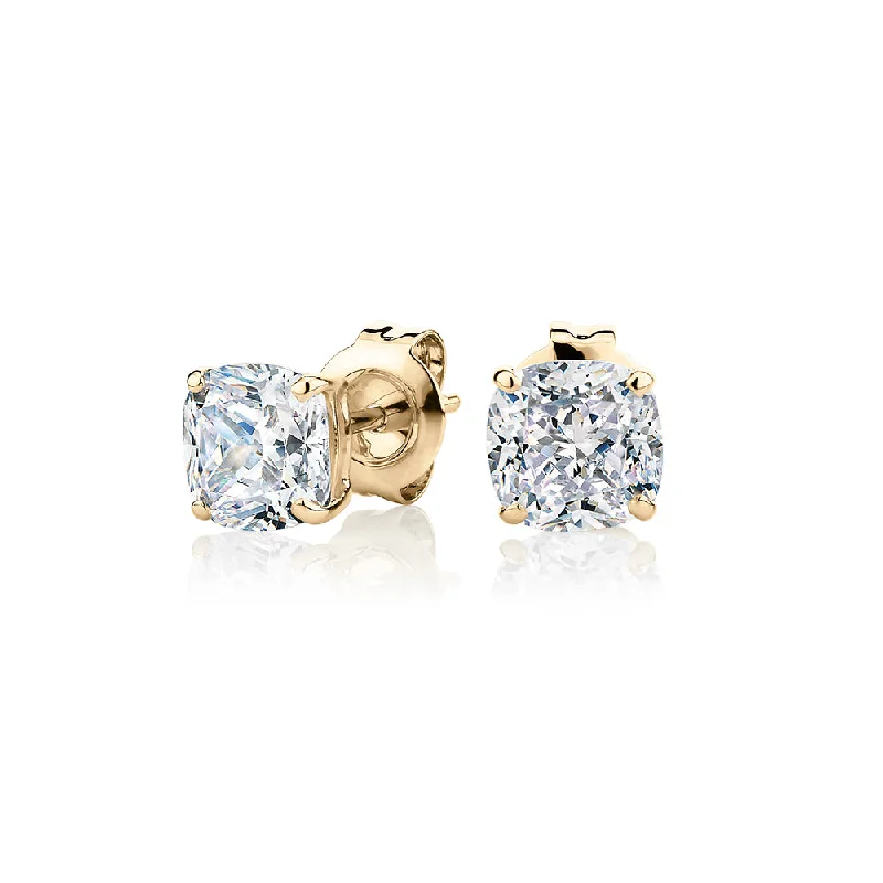 women's custom-made earrings-Cushion stud earrings with 2 carats* of diamond simulants in 10 carat yellow gold