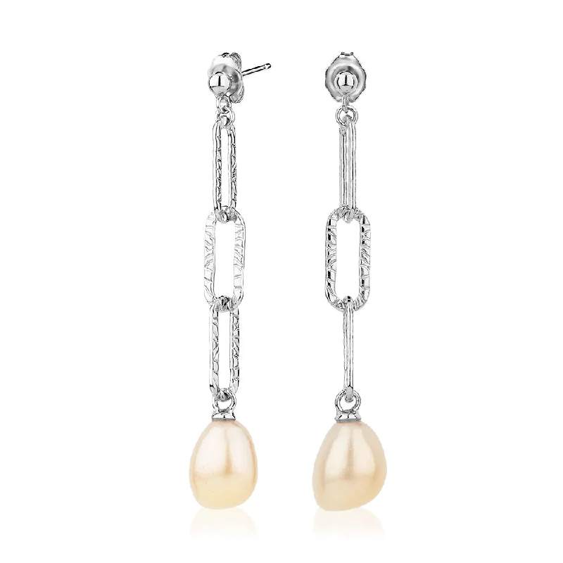 women's heart-shaped earrings-Cultured freshwater pearl drop earrings in sterling silver