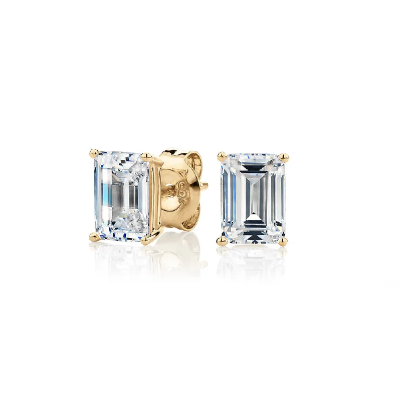 women's colorful earrings-Emerald Cut stud earrings with 2 carats* of diamond simulants in 10 carat yellow gold