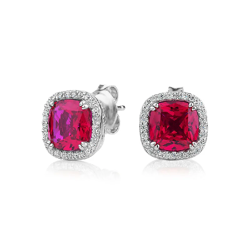 women's colorful earrings-Cushion and Round Brilliant halo stud earrings with ruby simulants and 0.25 carats* of diamond simulants in sterling silver