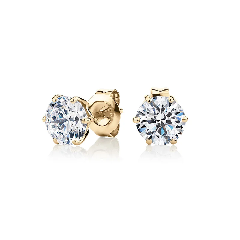 women's trendy earrings-Round Brilliant stud earrings with 2 carats* of diamond simulants in 10 carat yellow gold