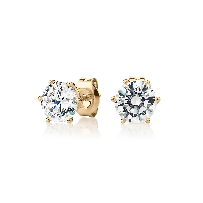 women's drop earrings-Round Brilliant stud earrings with 2 carats* of diamond simulants in 10 carat yellow gold