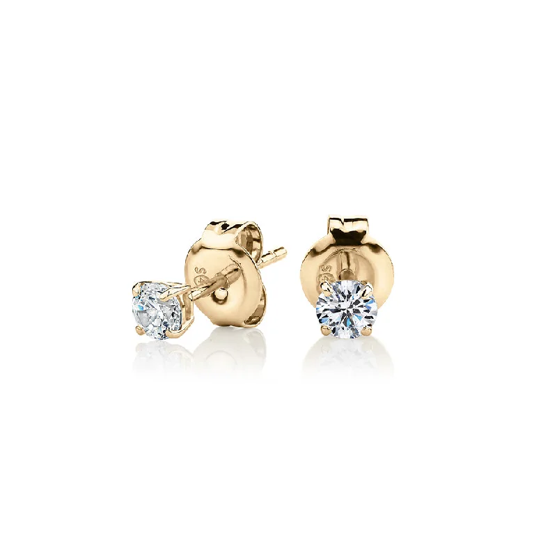 women's silver earrings-Round Brilliant stud earrings with 0.25 carats* of diamond simulants in 10 carat yellow gold