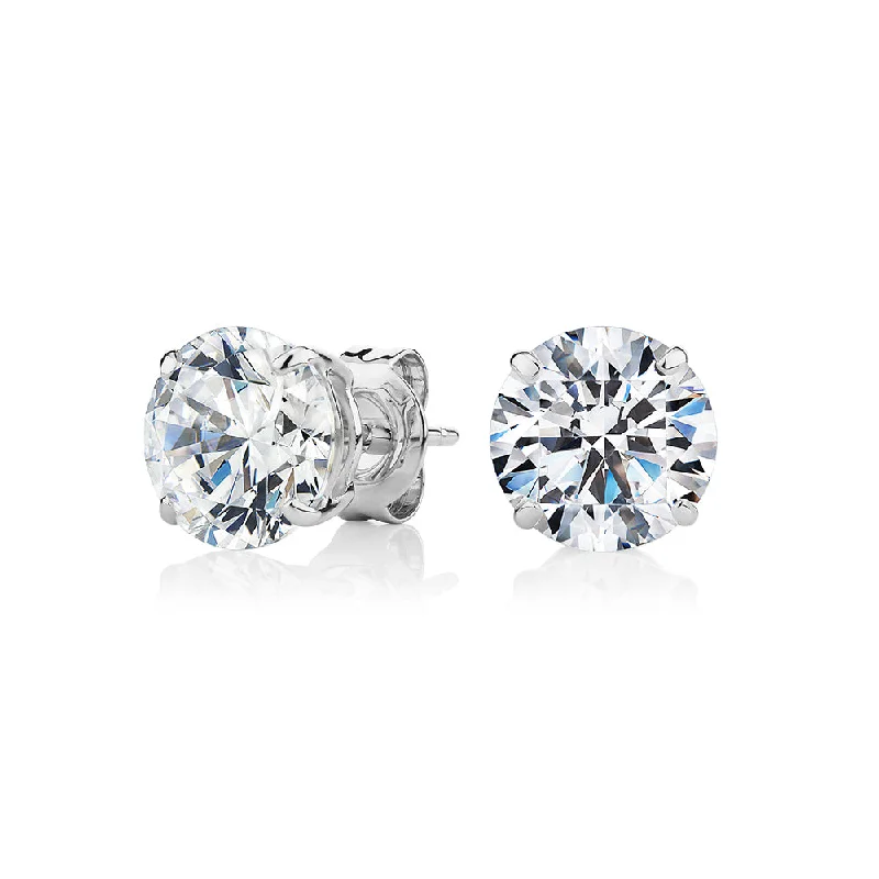 women's statement earrings-Round Brilliant stud earrings with 4 carats* of diamond simulants in 10 carat white gold