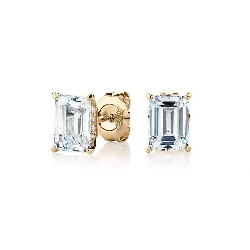 women's animal-shaped earrings-Emerald cut stud earrings with 2.24 carats* of diamond simulants in 10 carat yellow gold