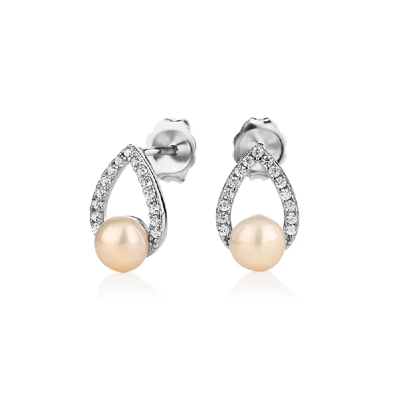 women's luxurious earrings-Cultured freshwater pearl stud earrings in sterling silver