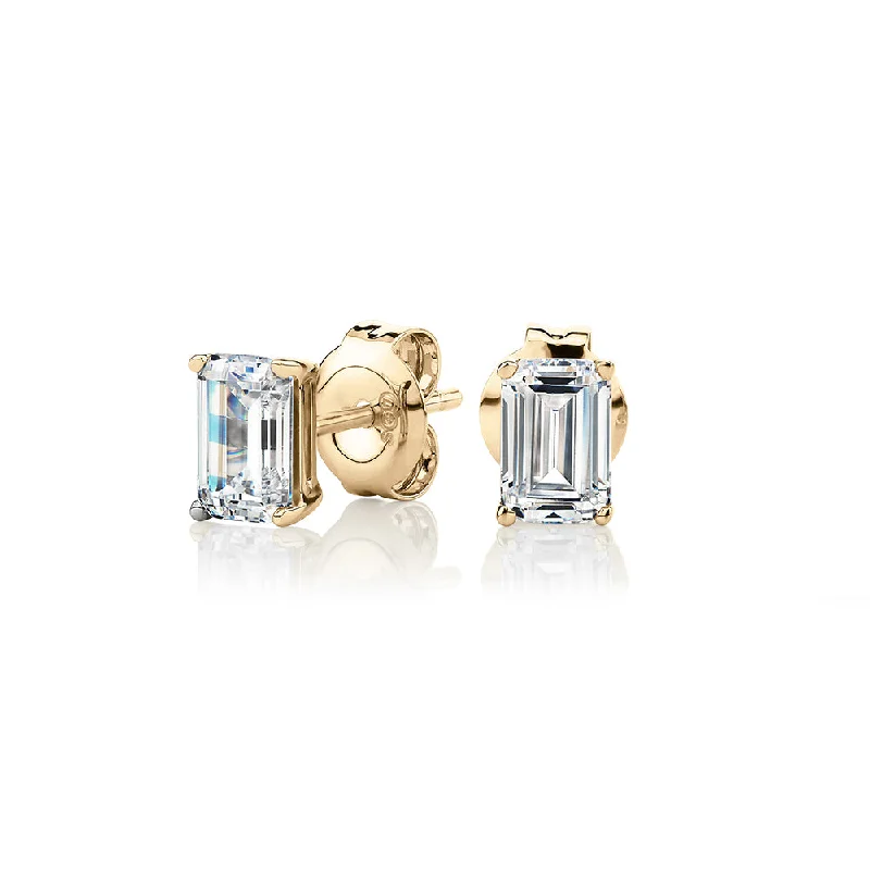 women's silver hoop earrings-Emerald Cut stud earrings with 1 carat* of diamond simulants in 10 carat yellow gold