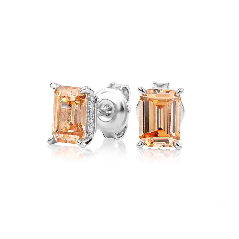 women's luxury hoop earrings-Emerald Cut and Round Brilliant stud earrings with 2.24 carats* of diamond simulants in sterling silver