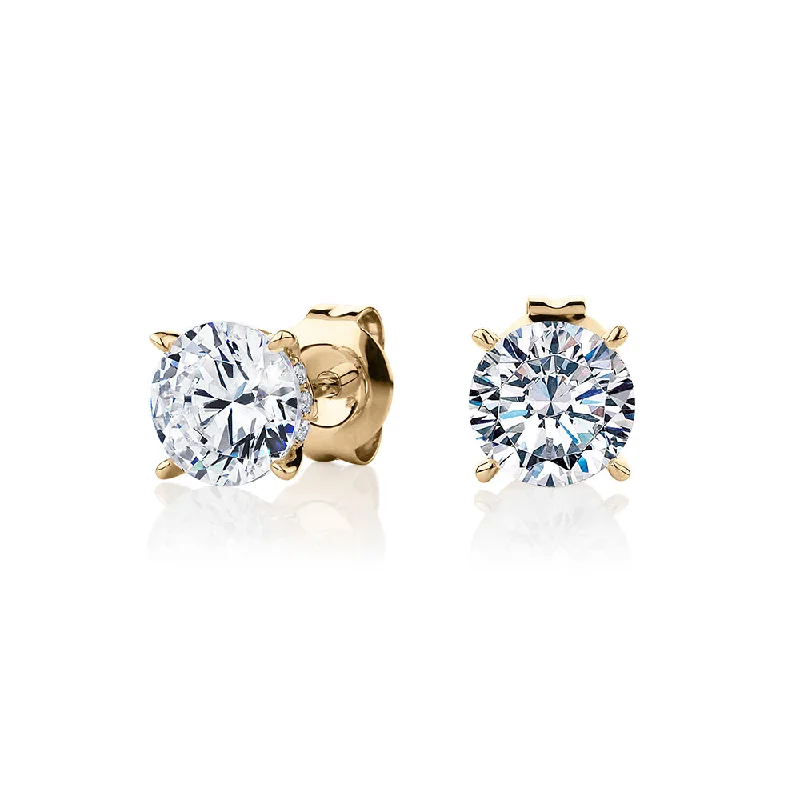 women's statement ear cuffs-Round Brilliant stud earrings with 2.18 carats* of diamond simulants in 10 carat yellow gold