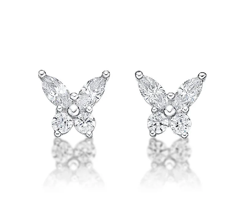 women's custom-made earrings-Round Brilliant and Marquise stud earrings with 0.8 carats* of diamond simulants in 10 carat white gold