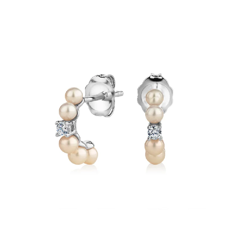 women's diamond stud earrings-Cultured freshwater pearl stud earrings in sterling silver