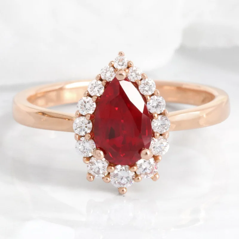 women's romantic engagement rings-Pear Ruby Engagement Ring in Tiara Halo Diamond Tapered Band