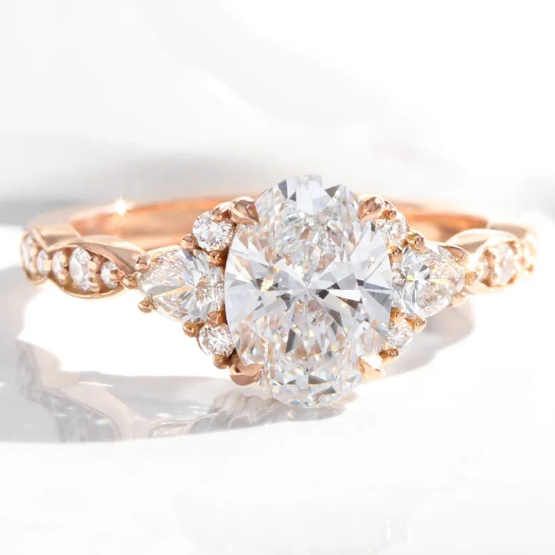 women's double halo engagement rings-2.0 Ct. Oval Lab Diamond Ring w/ Natural Diamonds in Dahlia 3 Stone Ring