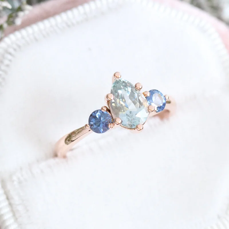 women's luxury gemstone engagement rings-Pear Aqua Blue Sapphire Engagement Ring in 14k Rose Gold 3 Stone Ring, Size 6.25