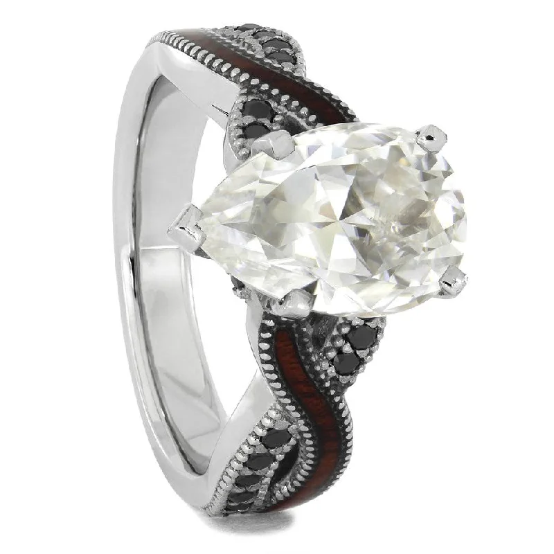 women's stylish engagement rings-Pear Cut Moissanite Engagement Ring With A Twist Shank