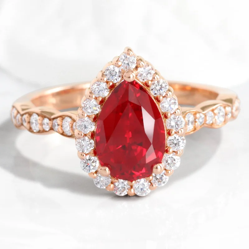 women's unique stone engagement rings-Pear Ruby Engagement Ring in Luna Halo Diamond Scalloped Band